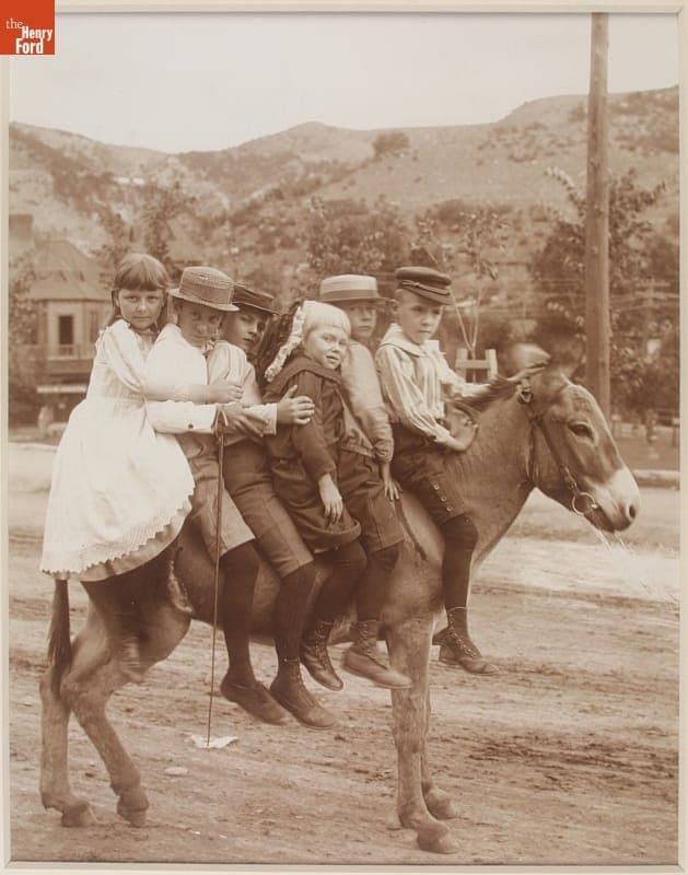 "Loaded," Children on a Donkey, Colorado, circa 1900