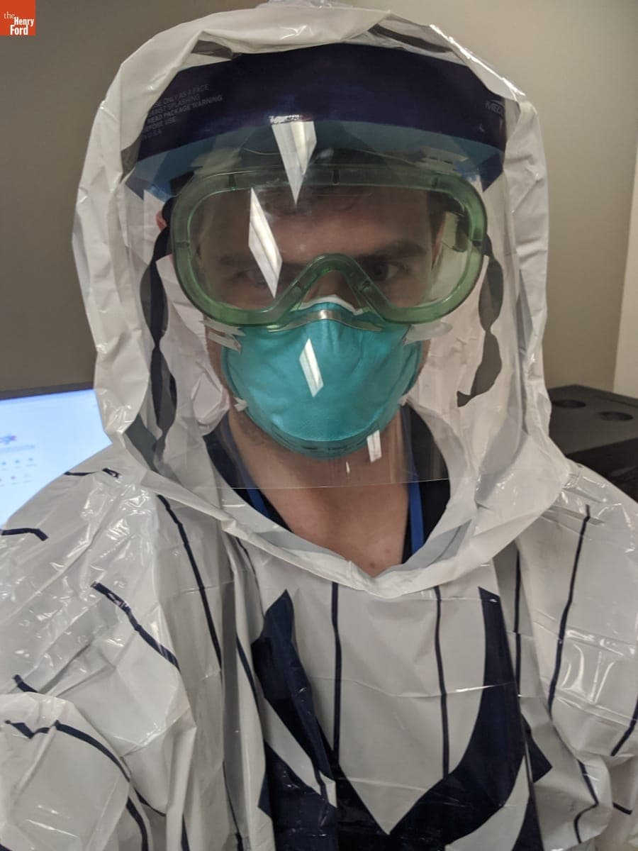 "Selfie" of Dana Larson, M.D. Wearing a New York Yankees Poncho and Other Personal Protective Equipment, March 31, 2020