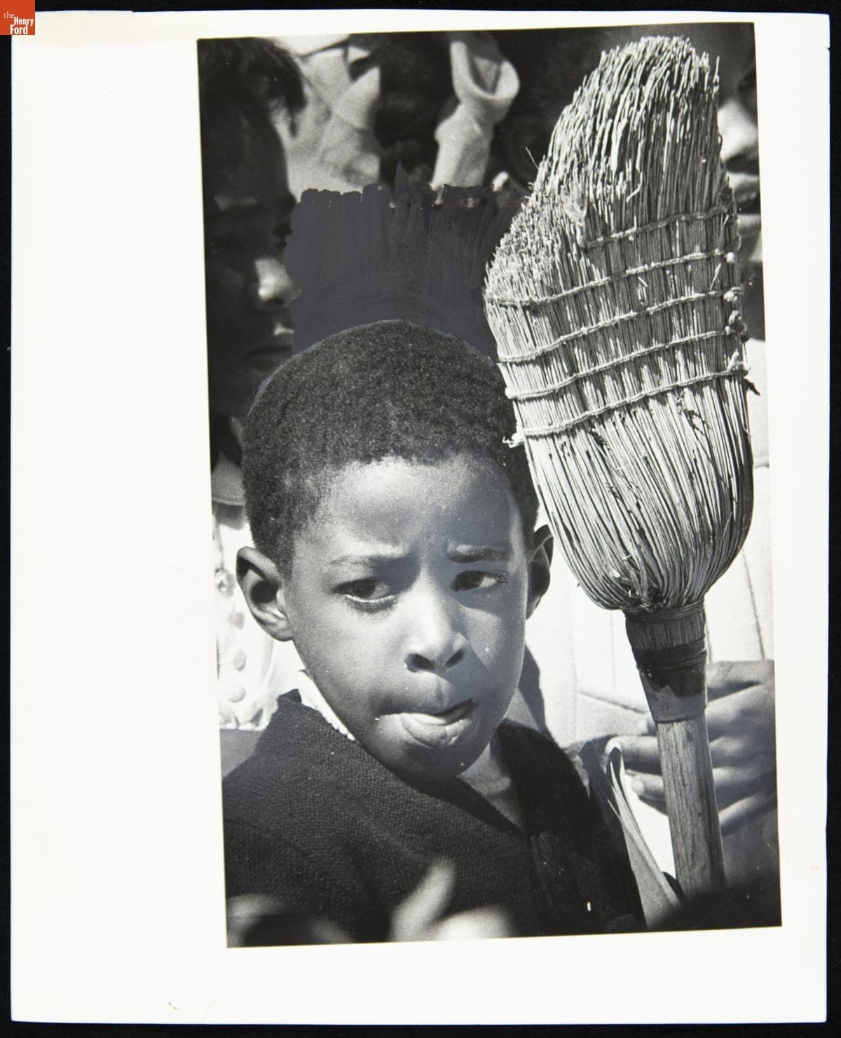 Angell Elementary School Student Todd Smith Holding a Broom, May 1970