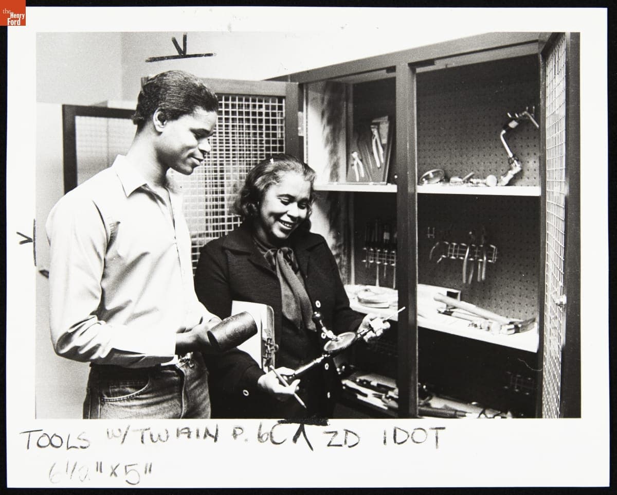 Michael Gibbons Checking Out Tools from Librarian Alice James at Mark Twain Branch of Detroit Public Library, February 1983