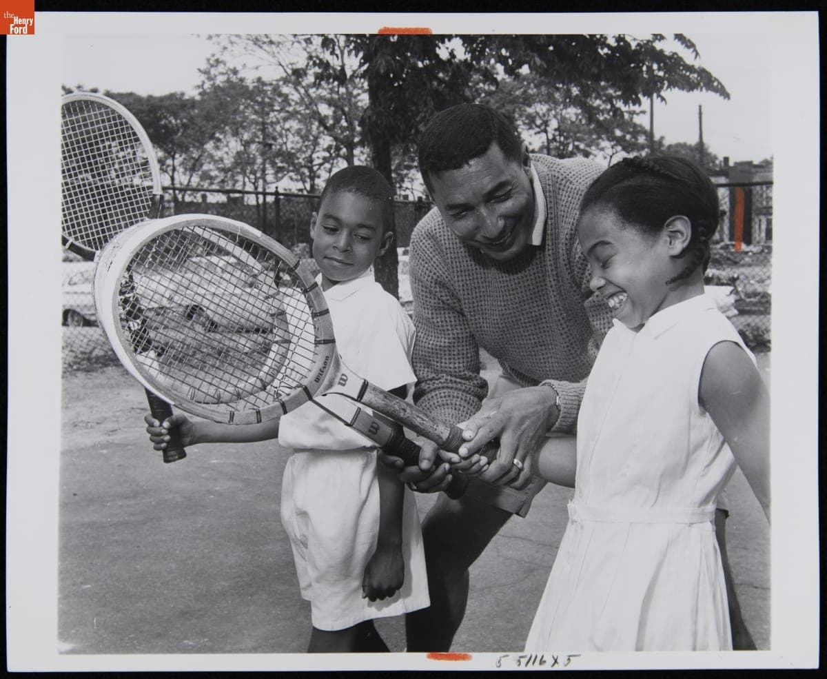 Delbert Russell Teaching Kevin Duckworth and Paula Smith How to Hold Tennis Rackets at the YWCA in Detroit, May 1962