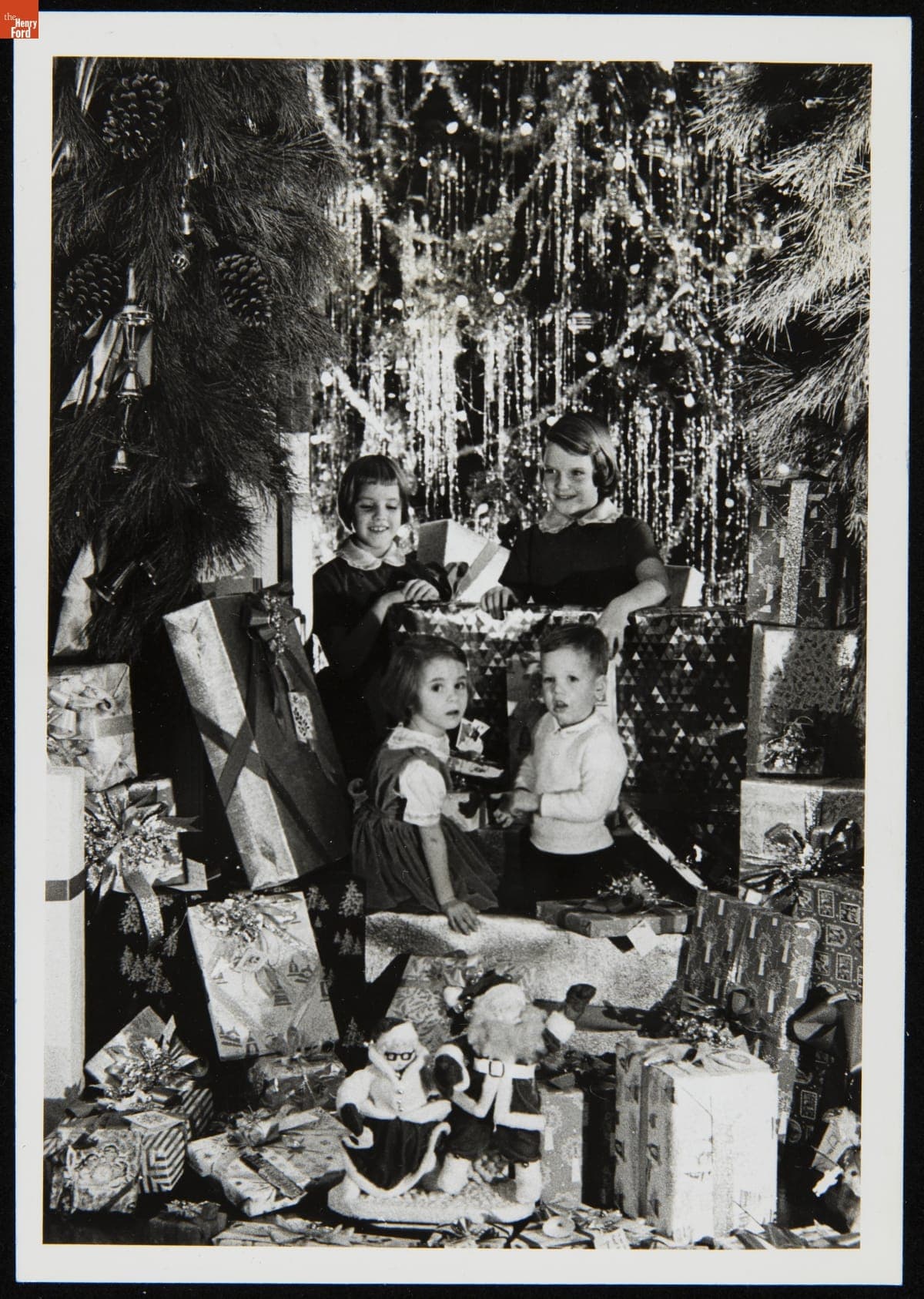 Sheila, Martha, Elizabeth, and William Clay Ford, Jr. in front of Christmas Tree, Ocean Lawn, Newport, Rhode Island, December 1959