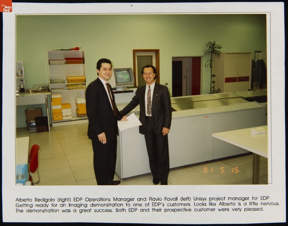 Unisys Corporation Employees Alberto Redigolo and Flavio Favali Preparing an Imaging Demonstration for a Customer, 1991