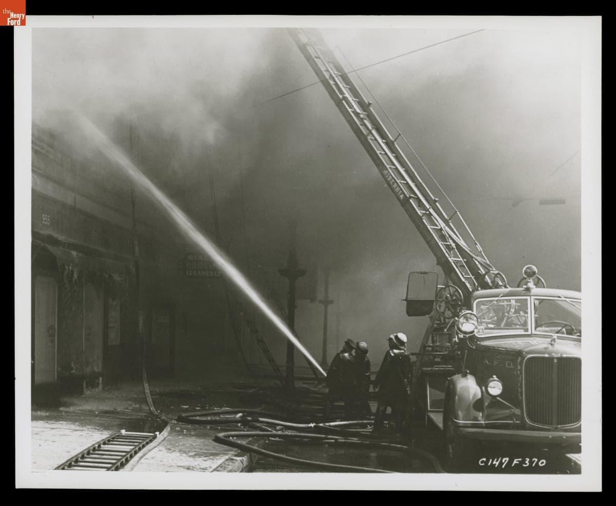 Firefighters Using Hoses at the Scene of a Fire, January 1947
