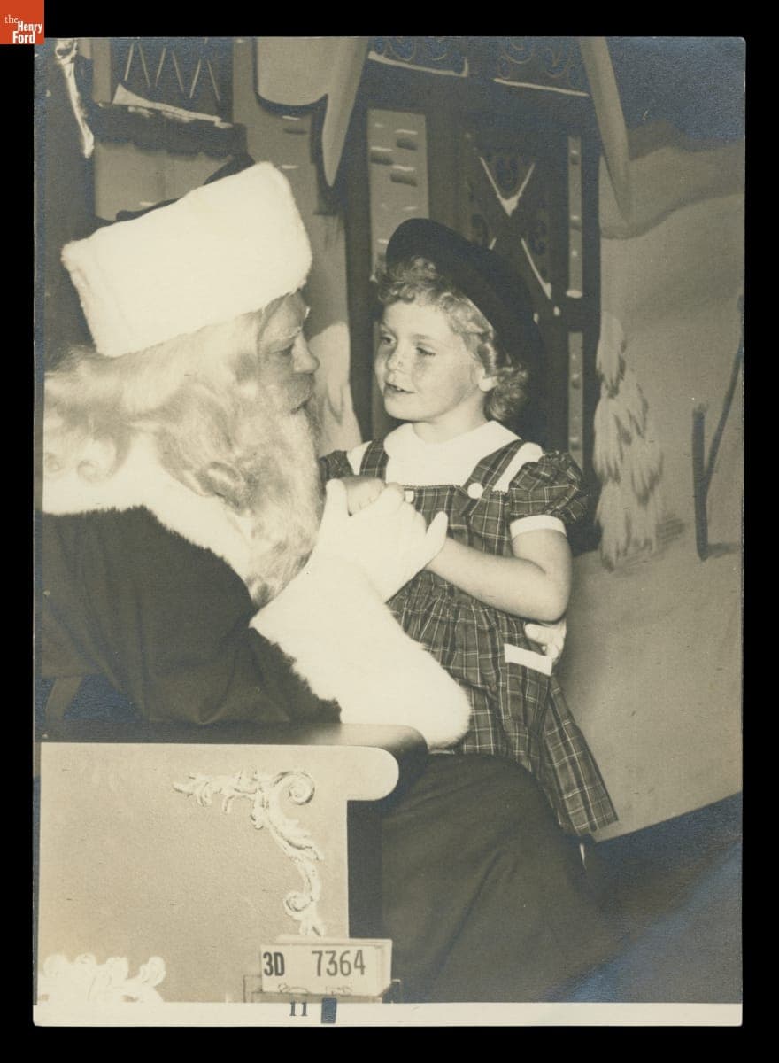 Andrea Makar with Santa Claus, circa 1950