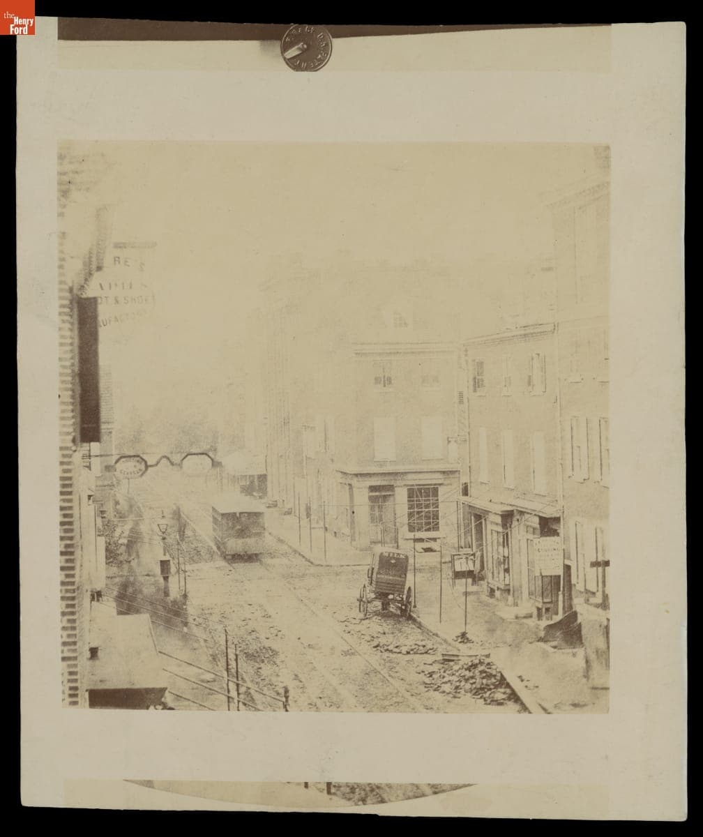 Milk Delivery Wagon on a City Street in Winter, circa 1865