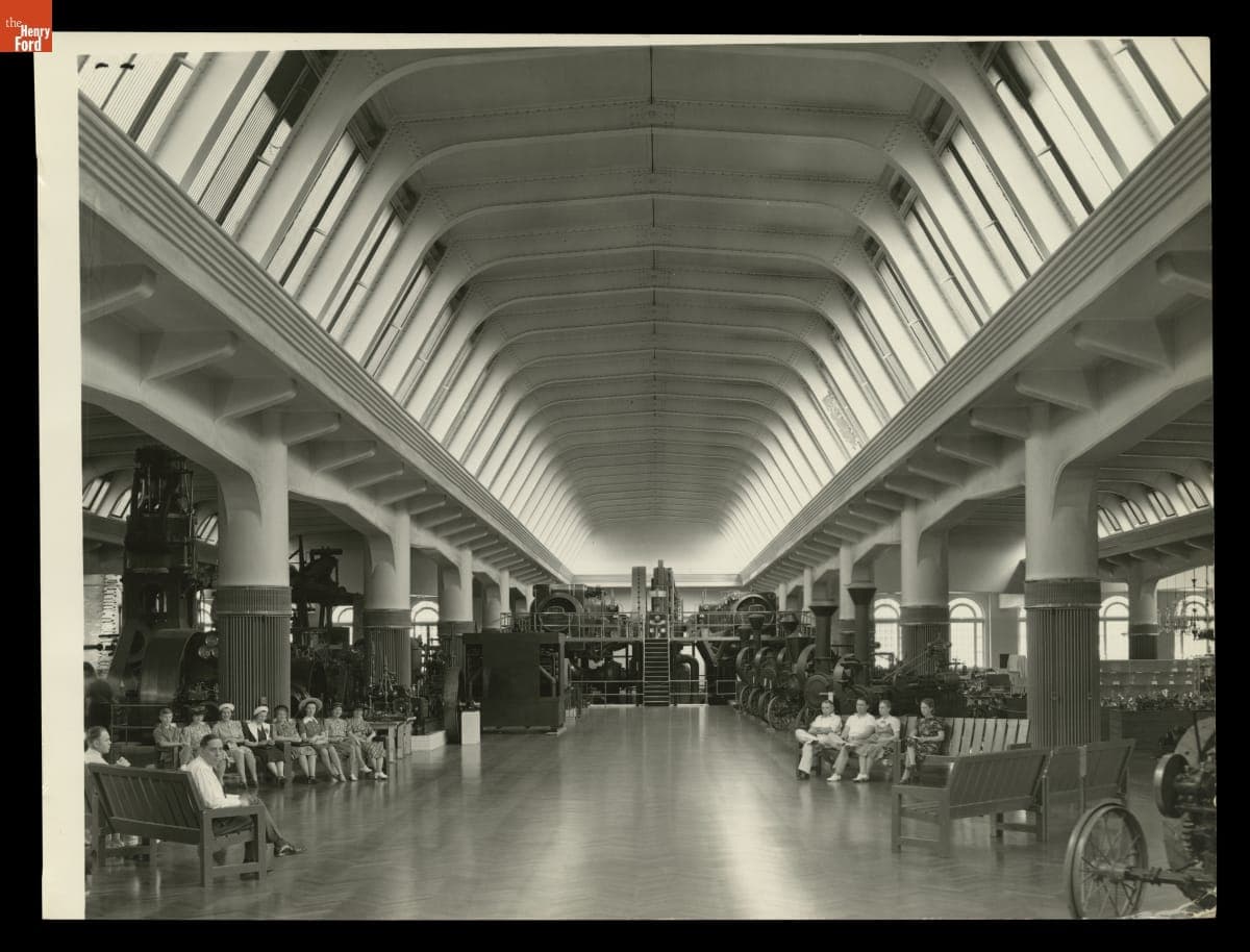 Group Seated in Henry Ford Museum near the Ford Highland Park Plant Gas-Steam Engine, July 1939