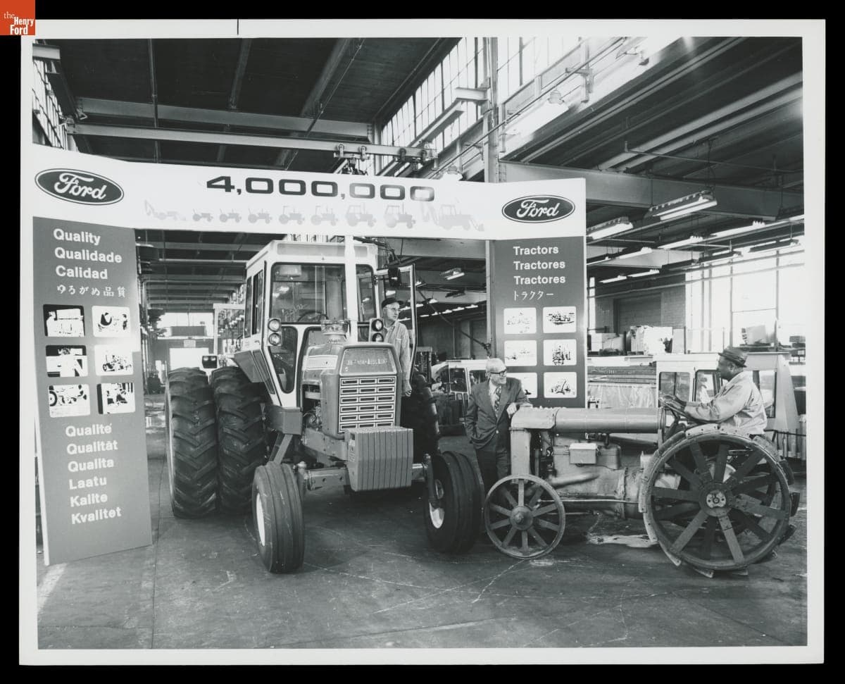 Employees with the 4,000,000th Ford Tractor and a Fordson Tractor at the Highland Park Plant, 1972
