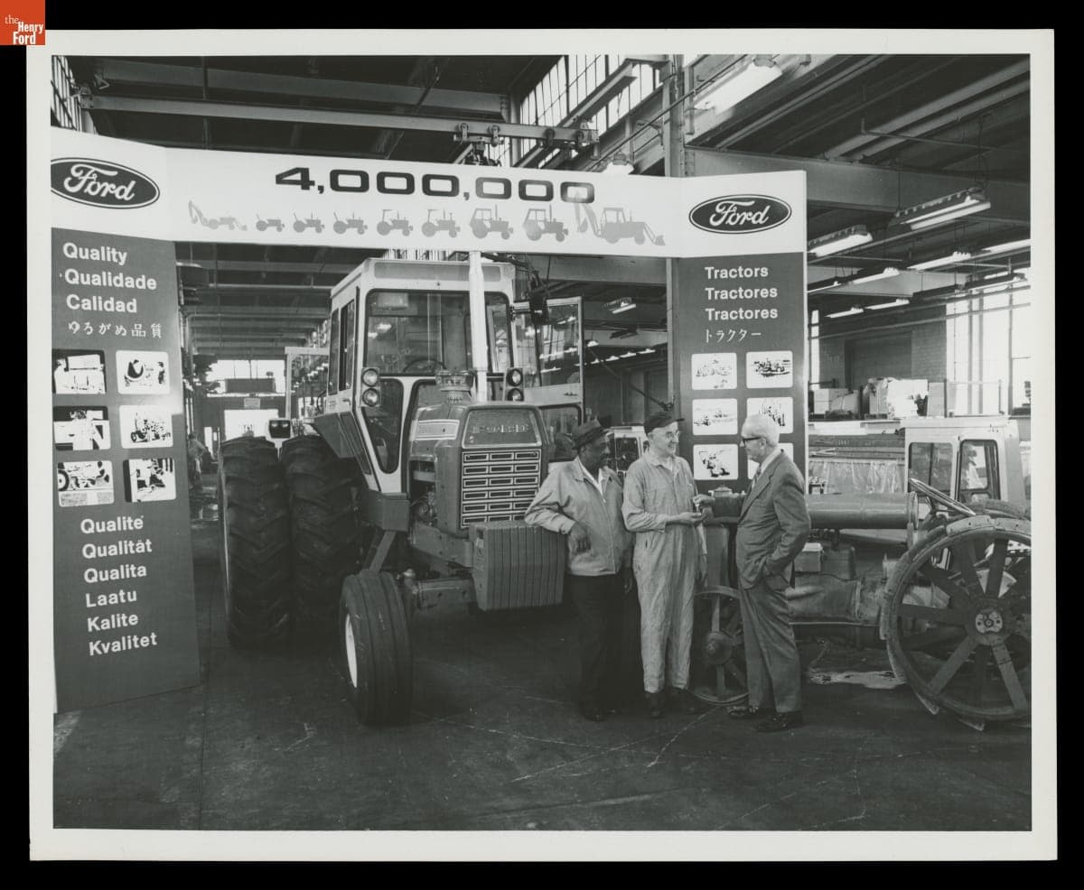 Employees with the 4,000,000th Ford Tractor and a Fordson Tractor at the Highland Park Plant, 1972