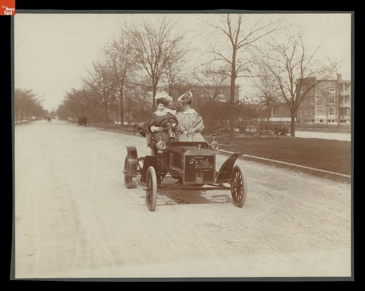 Myrle Clarkson Driving a 1906 Ford Model N with Clara Ford as Passenger