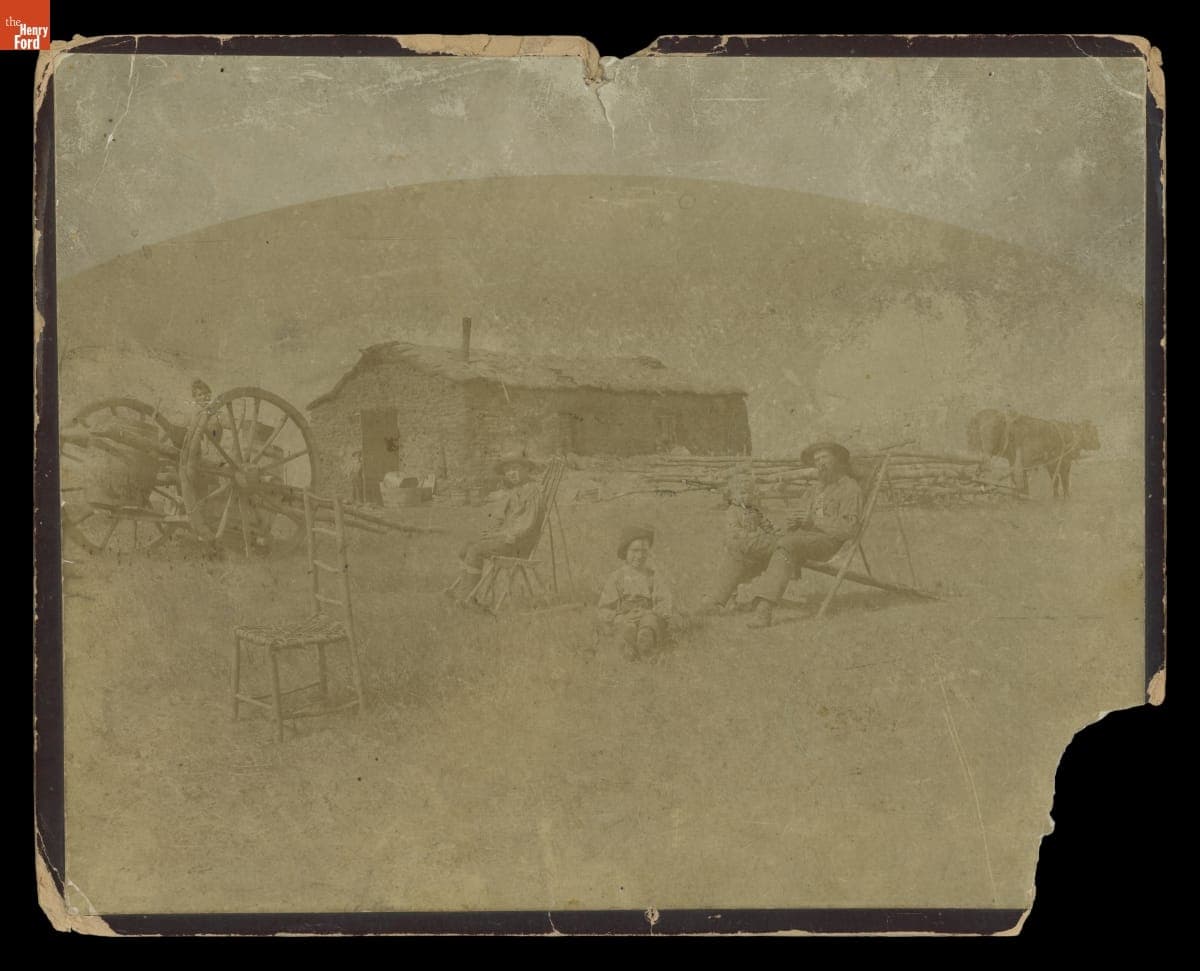 Family in Front of a Sod House