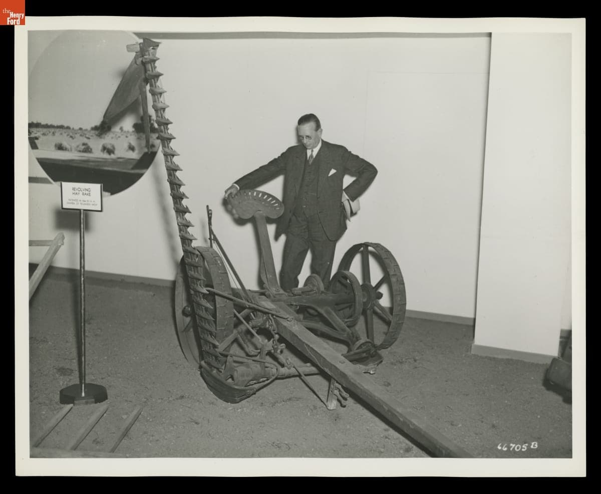 Man Examining Agricultural Equipment on Exhibit at the Michigan State Fair, September 10, 1936