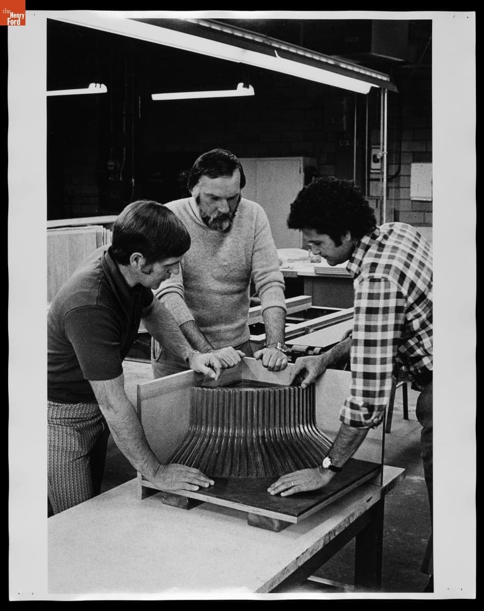 Bob Blaich and Don Chadwick Examining Modular Sofa Component, circa 1973