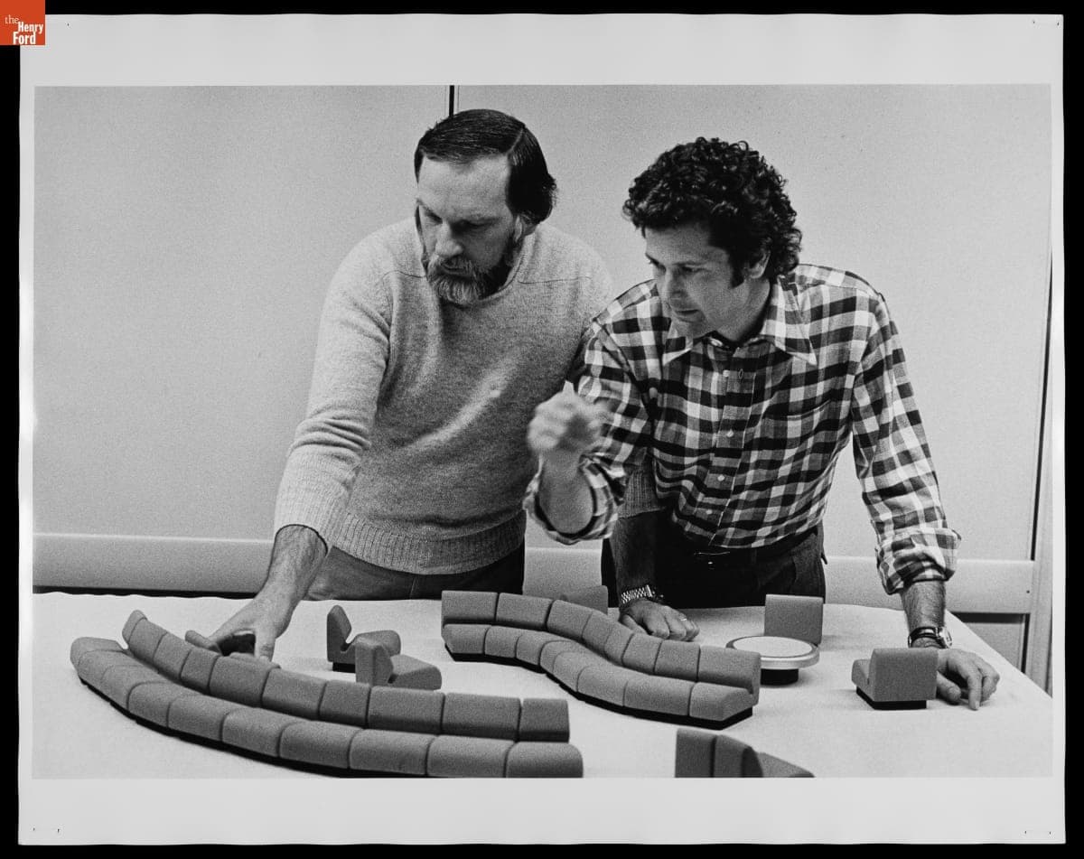 Bob Blaich and Don Chadwick Examining Modular Sofa Component, circa 1973