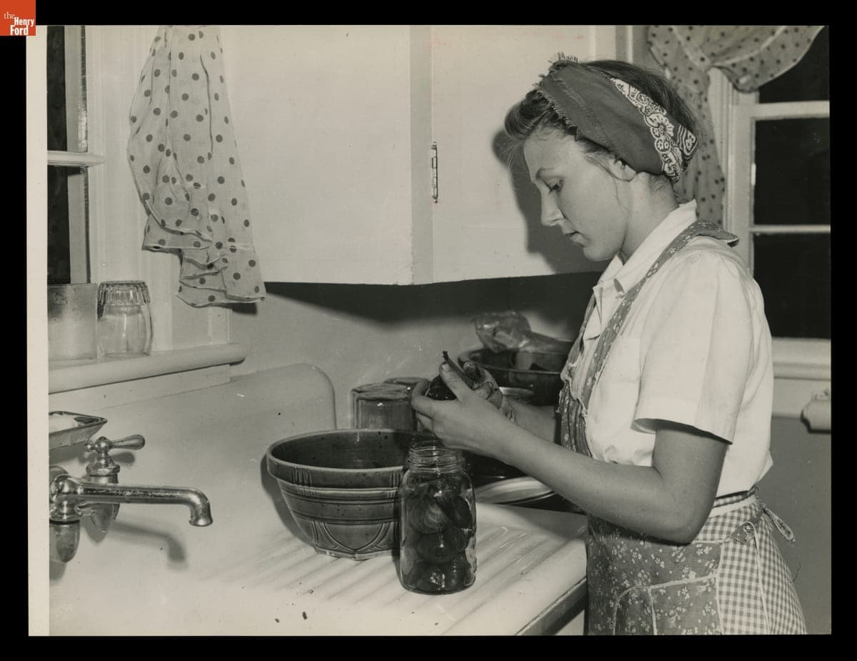 Macon (Michigan) High School Student Joan Cadmus Fills a Can with Cooked Beets for Processing, August 1943