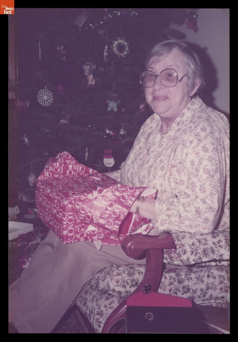 Emeline Morrow Miner Opening a Christmas Present, December 25, 1984