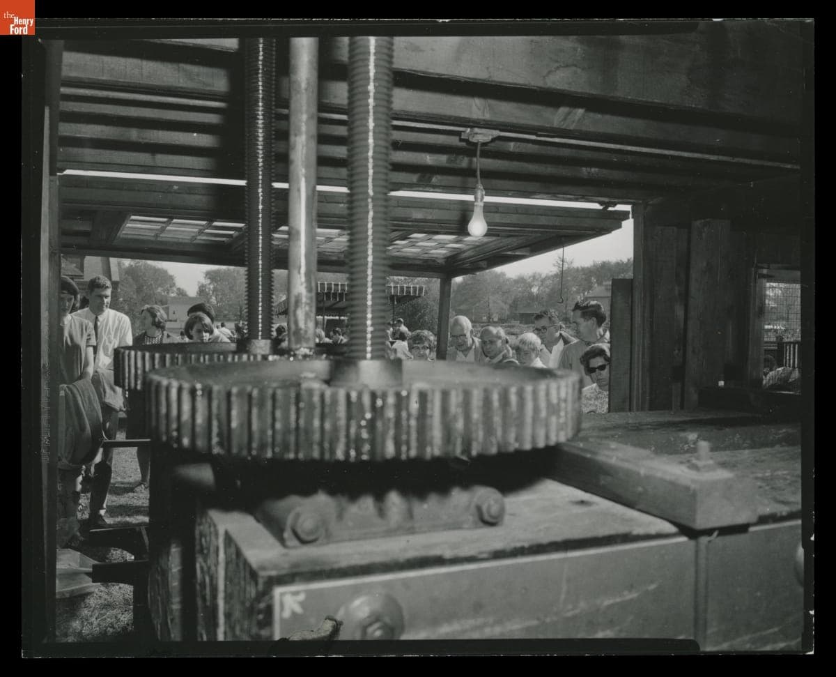 Guests Watching Cider Making Process inside Greenfield Village Cider Mill, 1968-1971