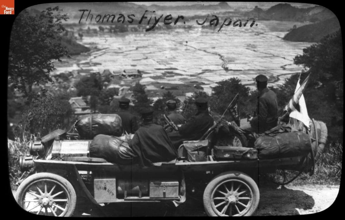 Team Sitting in the Thomas Flyer Looking over Rice Paddies in Japan, New York to Paris Race, 1908