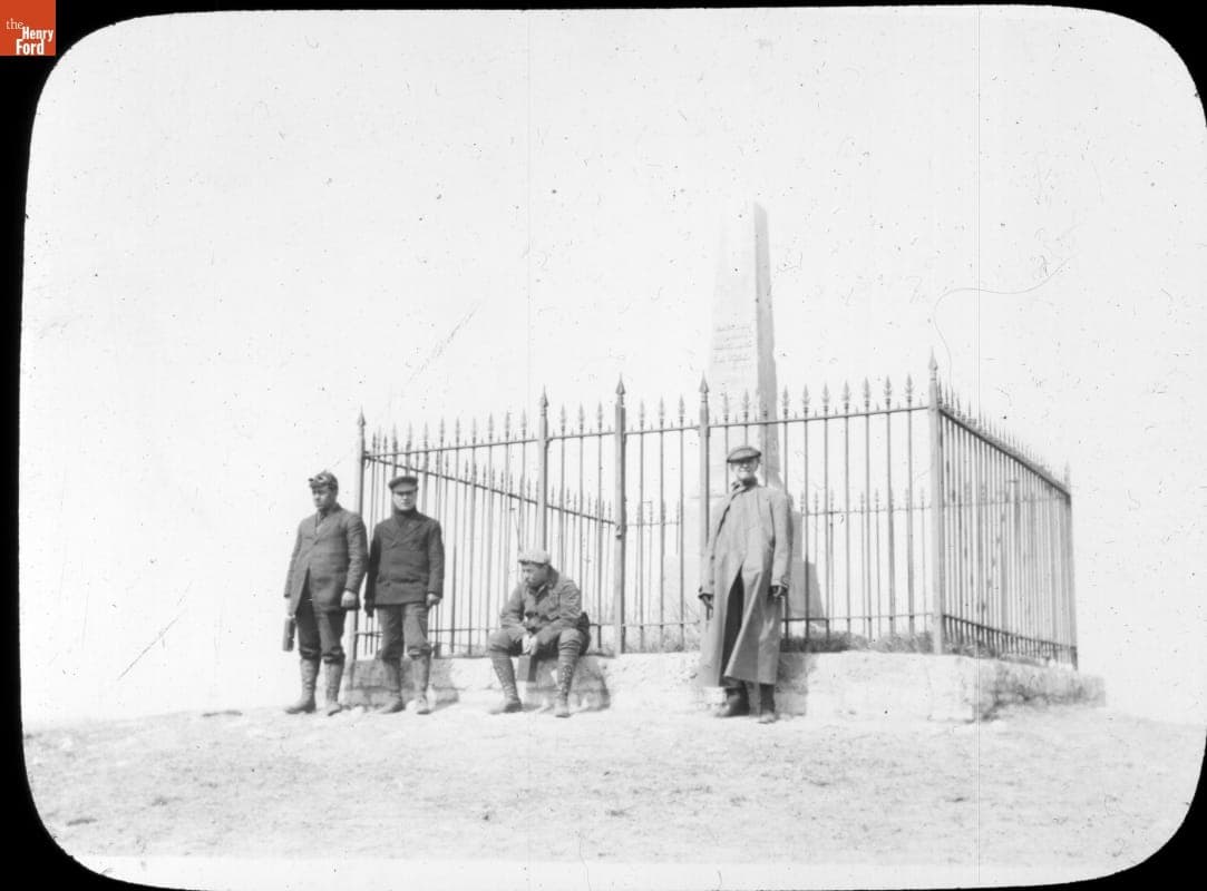 George Miller in Front of Obelisk Monument, Russia, during the New York to Paris Race, 1908