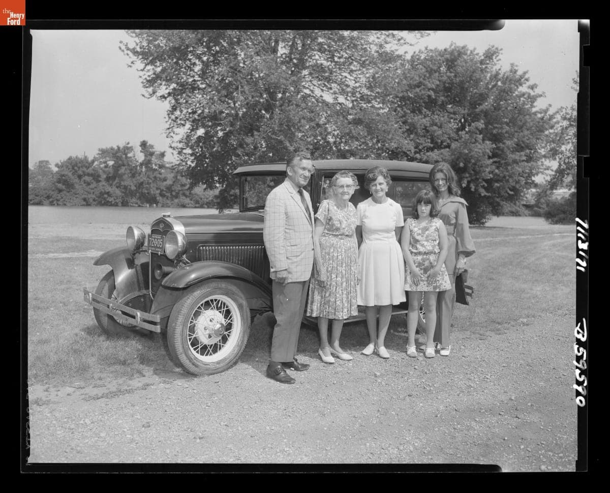 Gus Munchow Greets Louise Lane, a Former Neighbor of Henry Ford, and Her Family in Greenfield Village, July 15, 1971