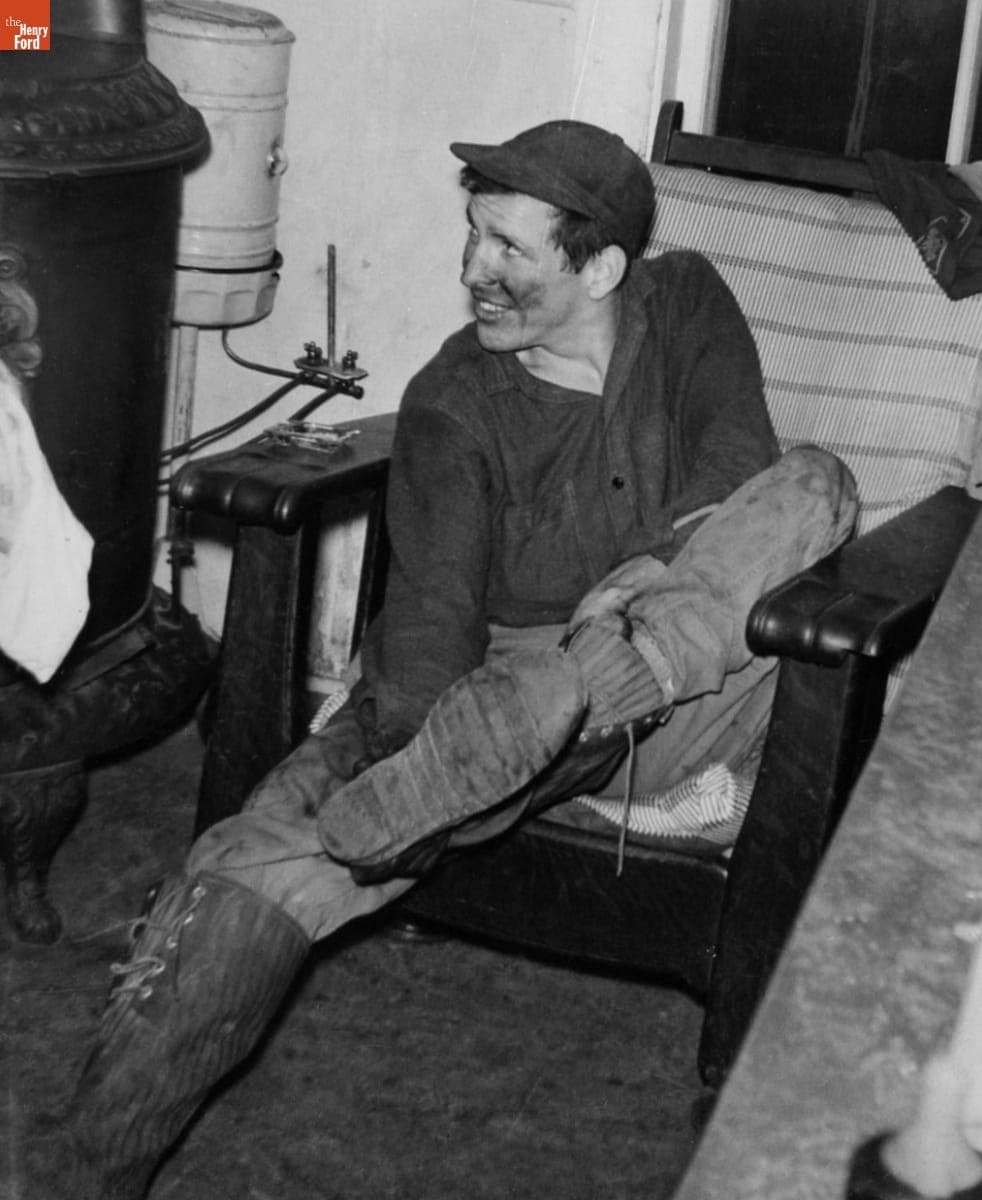 Bob Kelley near the Kitchen Heating Stove in the Kelley House in Rockville, Connecticut, 1948
