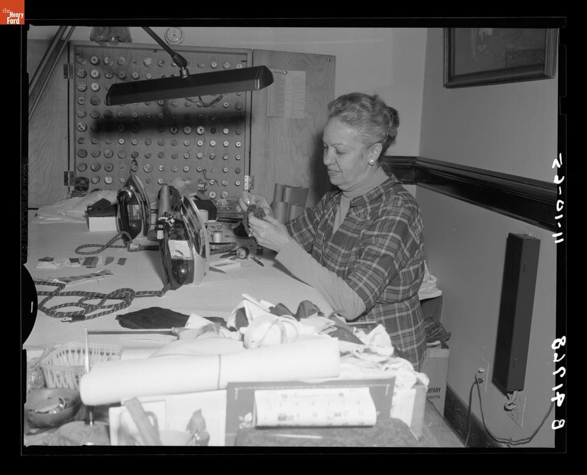 Yvonne Prieur of the Decorative Arts Department at Work Sewing, 1965