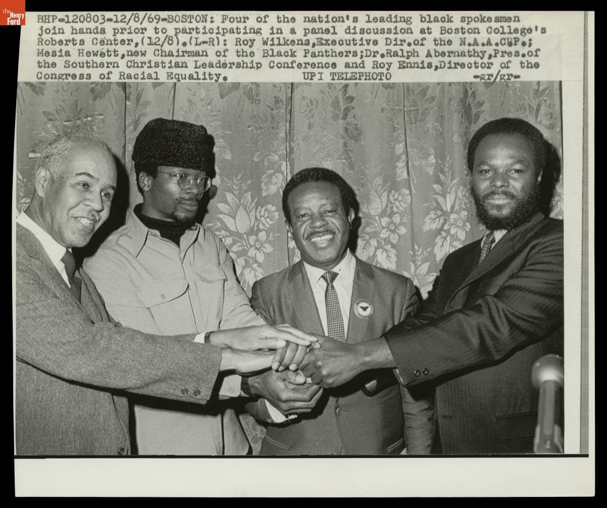 Roy Wilkins, Mesia Hewett, Ralph Abernathy, and Roy Ennis Priot to a Panel Discussion at Boston College's Roberts Center, December 8, 1969