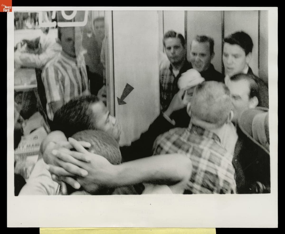 John Lewis Falls after Being Struck while Protesting at a Nashville Restaurant That Refused to Serve Blacks, May 1, 1964