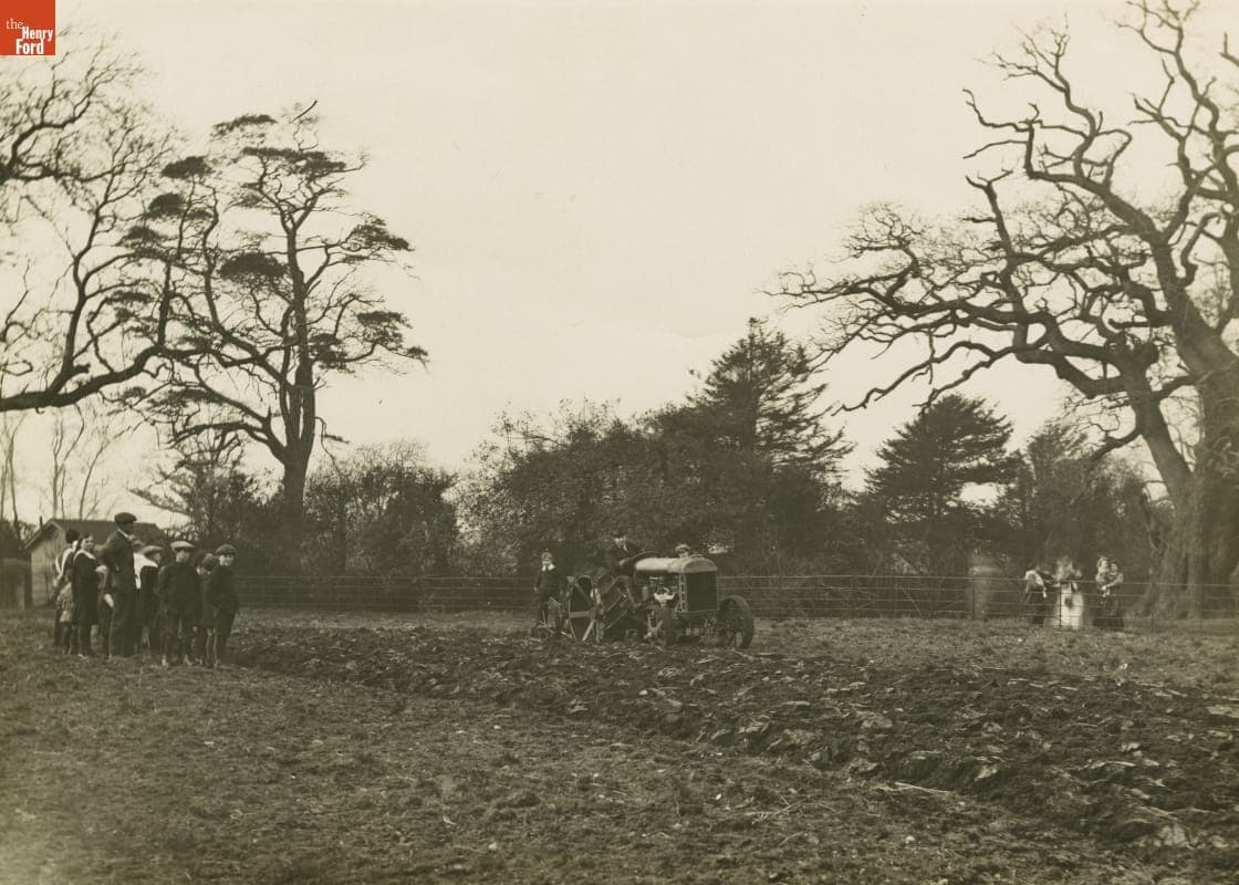Watching a Tractor Plowing the Field at Oughtrington Hall, Cheshire, England, 1918
