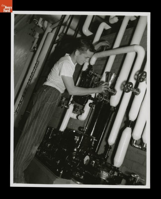 Young Man Working at Willow Run Ford Village Industry Plant, May 1940