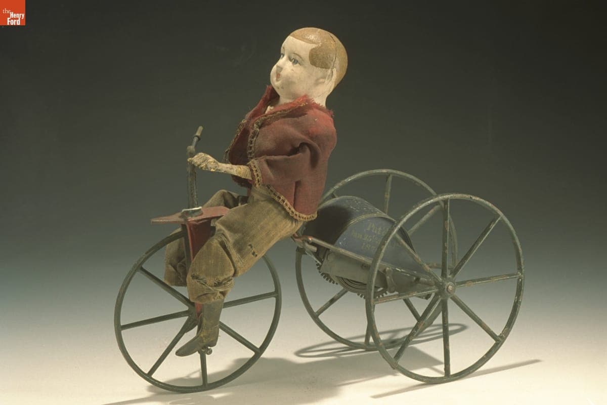 Boy on Mechanical Velocipede, 1870