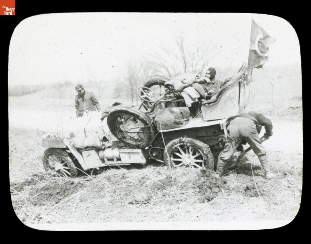 Digging the Thomas Flyer Out of Mud during the Pathfinder Tour before the New York to Seattle Race, 1909