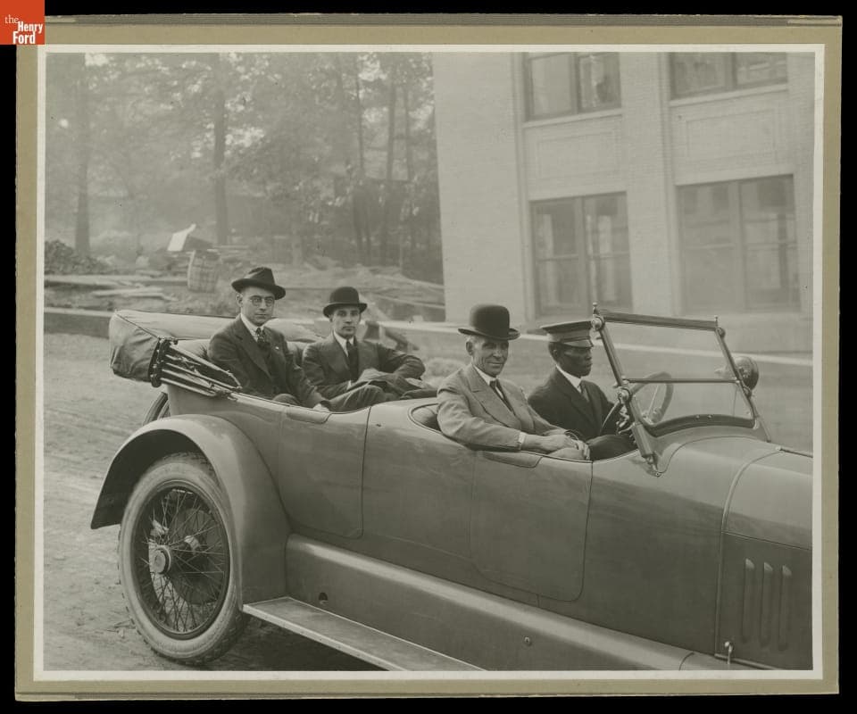 Edsel Ford and Henry Ford, with Unidentified Passenger and Chauffeur, Riding in a 1916 Mercer Touring Car, circa 1920