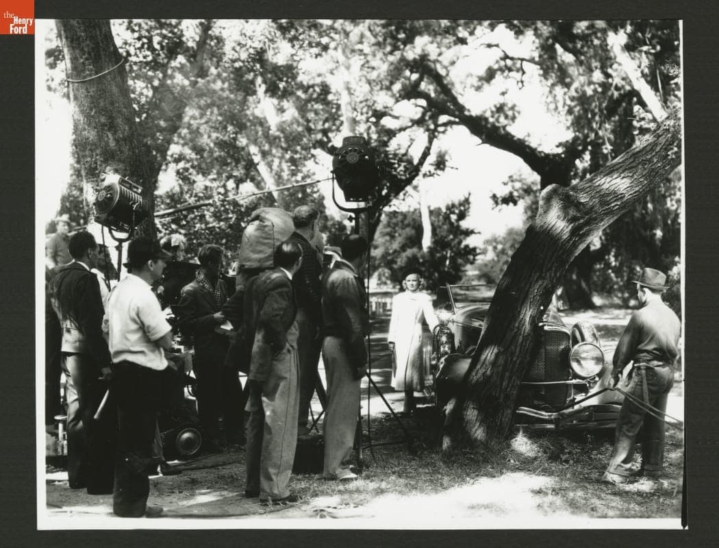 Claire Trevor Beside a 1932 Duesenberg Phaeton on Set of "Big Town Girl," 1937