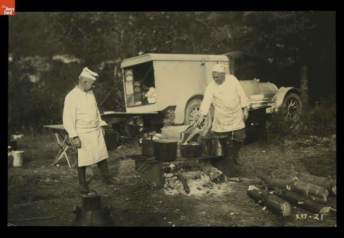 The "Vagabonds" Service Crew Fixing a Campfire Meal, 1921