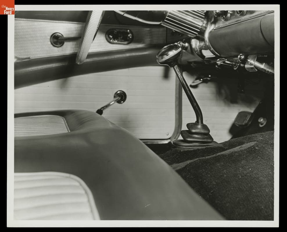 Detail Interior View of Gearshift, Seat and Interior Door Area in 1957 Ford Thunderbird