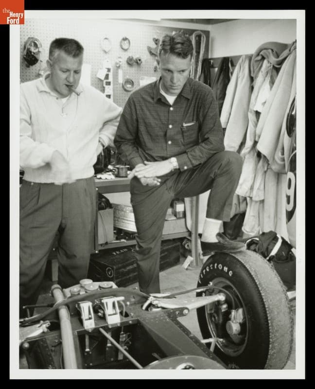 Dan Gurney Looking at Chassis, Lotus Kingman Test, February, 1963