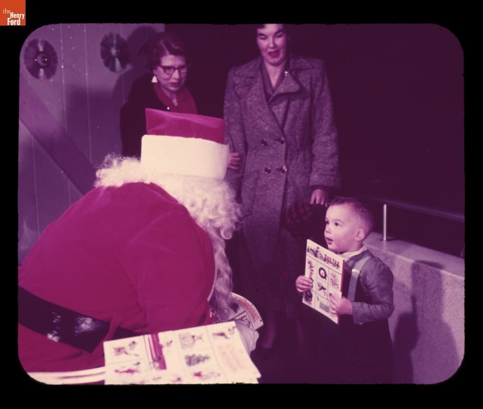 Little Boy Talking to Santa inside Ford Rotunda at Christmas, 1953-1961