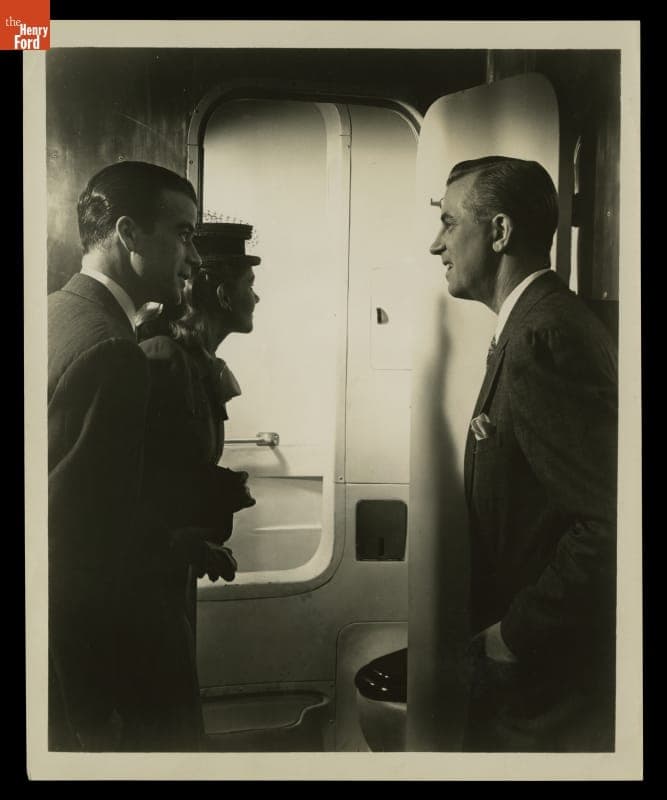 Man Showing Model Dymaxion House to a Couple, 1946