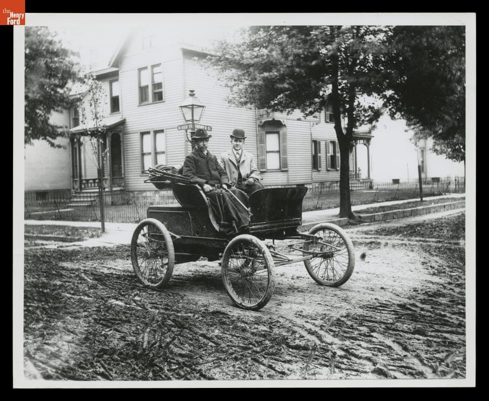 Alexander Winton and Mr. Shanks in an 1898 Winton Roadster