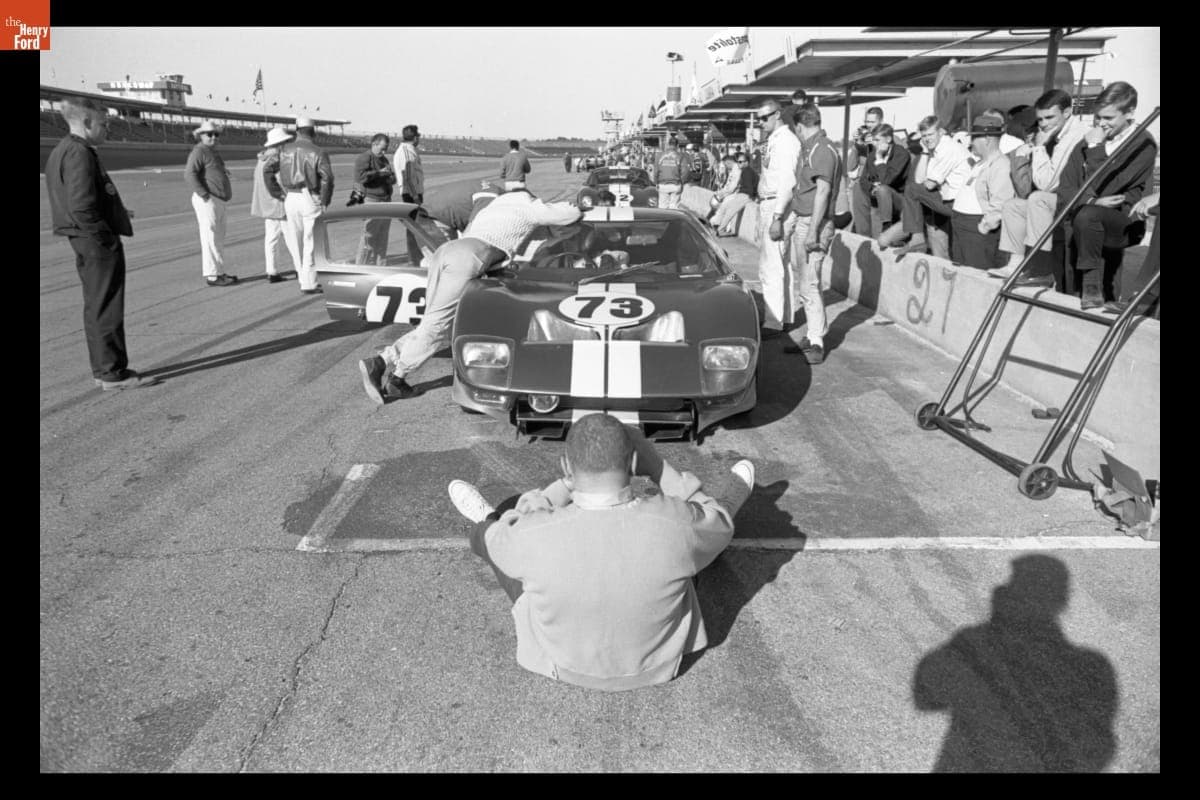 Dave Friedman Photographing Ford GT40 driven by Ken Miles and Lloyd Ruby at the Daytona Continenal 2000 km Race, February 1965