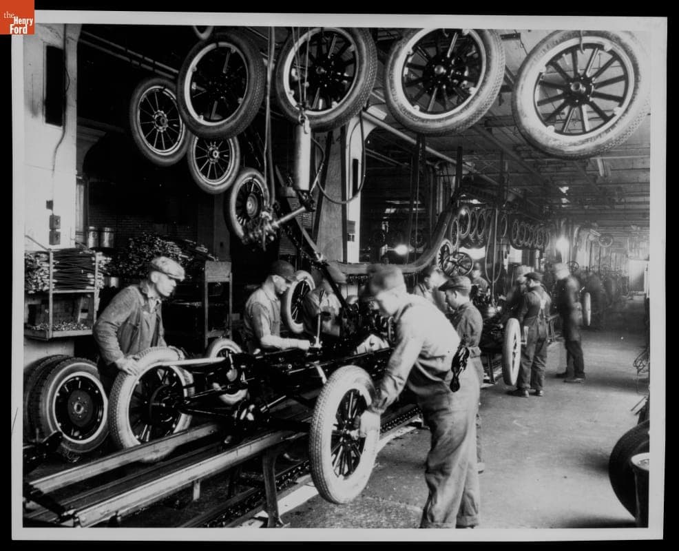 Workers Installing Tires on Ford Model T Assembly Line at Highland Park Plant, circa 1925