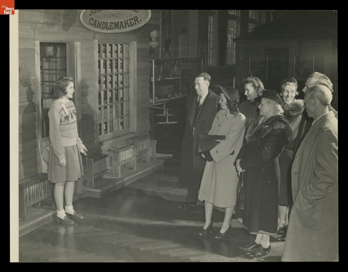 Edison Institute School Student Leading a Tour of Henry Ford Museum "Street of Shops," circa 1943