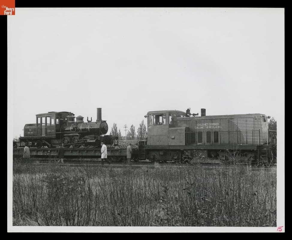 Torch Lake Steam Locomotive Loaded on a Flatcar for Transport from Ahmeek Mine near Calumet, Michigan, November 1969