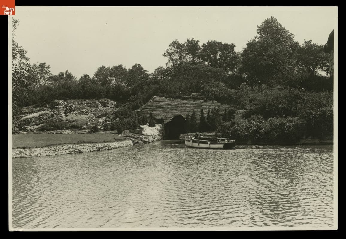 Clara Ford Piloting the "Callie B" in the Rouge River at Fair Lane Estate, Dearborn, Michigan, circa 1925