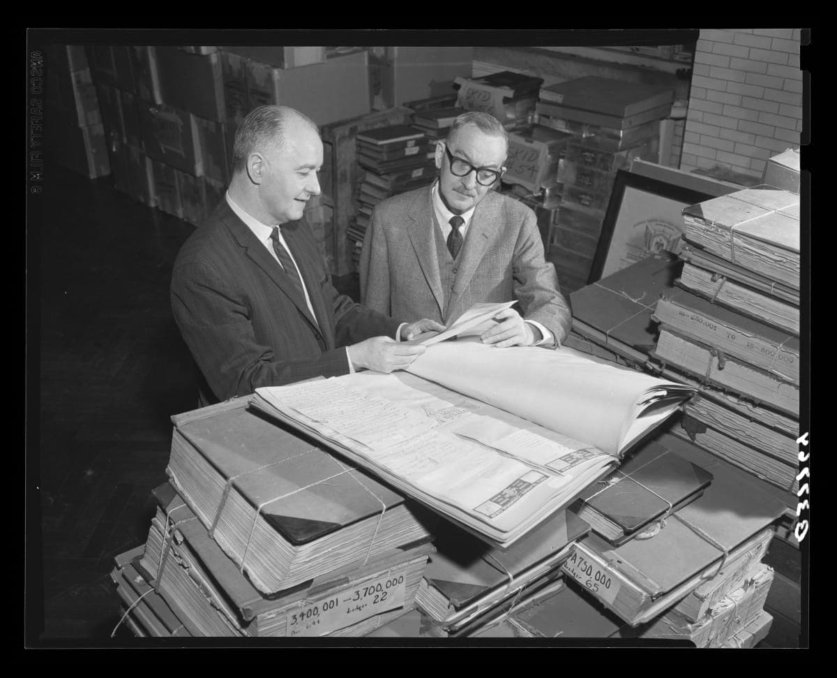 Donald A. Shelley, Executive Director, and Henry Edmunds, Archives Director, Examining Ford Archives Material after Arrival at Henry Ford Museum, December 30, 1964