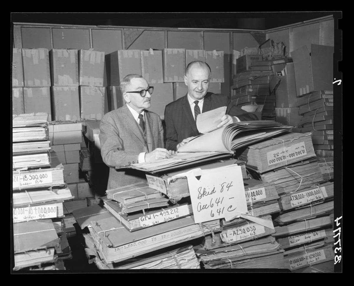 Donald A. Shelley, Executive Director, and Henry Edmunds, Archives Director, Examining Ford Archives Material after Arrival at Henry Ford Museum, January 18, 1965