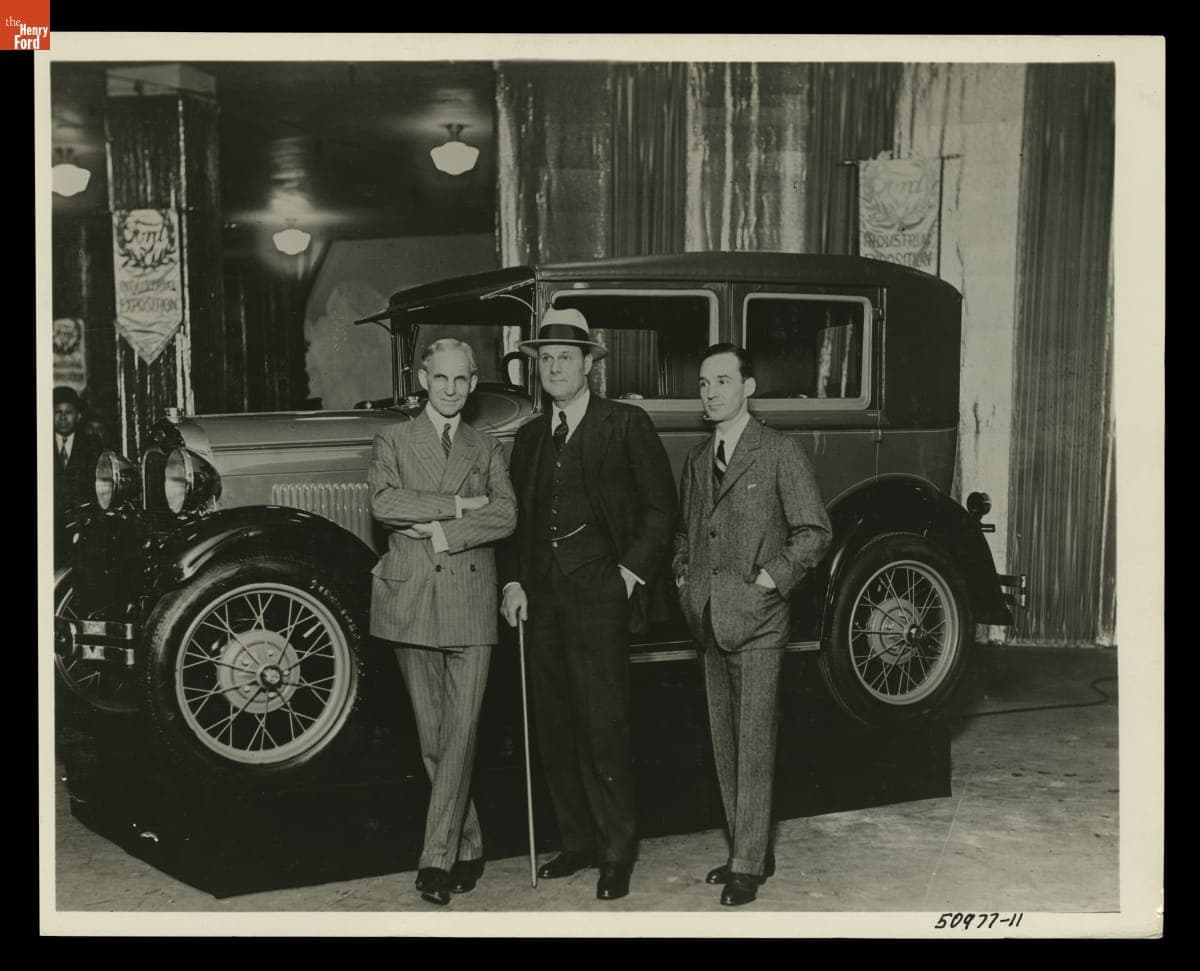 Henry Ford, Tex Rickard, and Edsel Ford with a 1928 Ford Model A at the Ford Industrial Exposition, New York City, January 1928