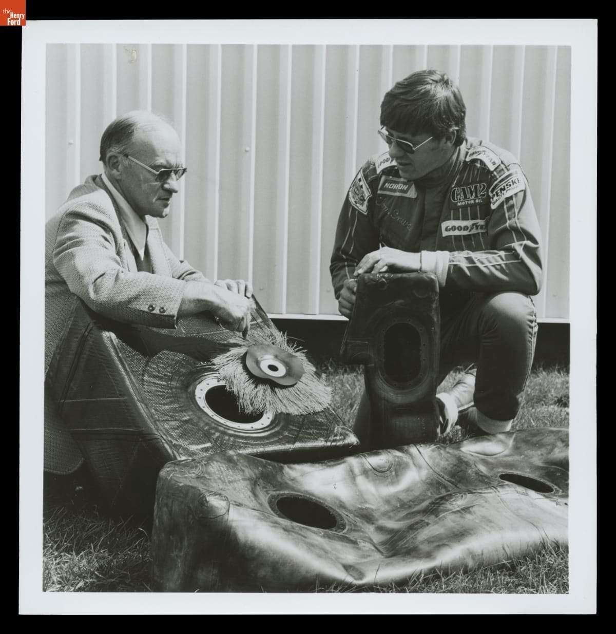 Engineer Bill Ludwick Explaining Goodyear's "Crashworthy" Fuel System to Driver Tom Sneva, 1975-1976