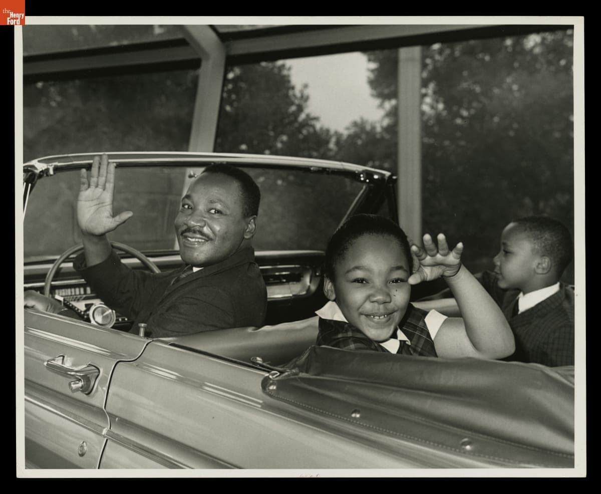 Rev. Martin Luther King, Jr. and His Children Riding the "Magic Skyway" at the Ford Motor Company Pavilion at the New York World's Fair, 1964-1965